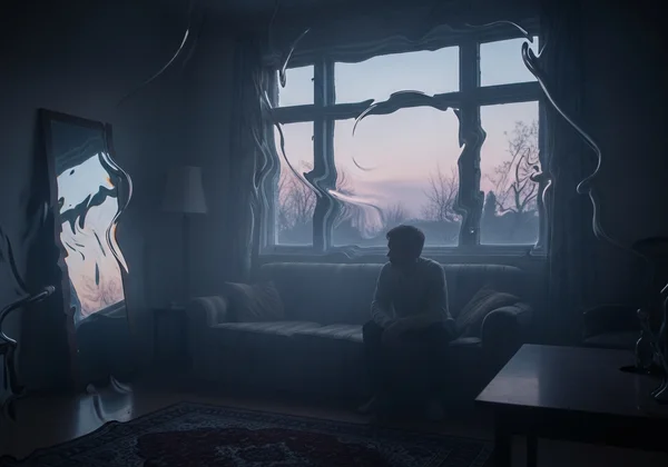 Person alone, experiencing emotional overwhelm and dissociation